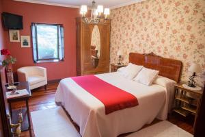 En eller flere senge i et værelse på Casa Rural-Apartamentos Zelaikoa