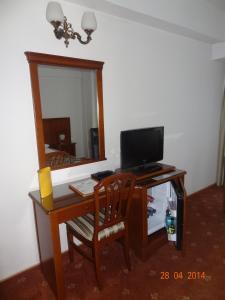 TV a/nebo společenská místnost v ubytování Hotel Emma West