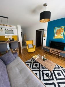 Televízia a/alebo spoločenská miestnosť v ubytovaní La Siesta Apartment