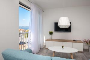 Μια τηλεόραση ή/και κέντρο ψυχαγωγίας στο Apartments Dva Galeba