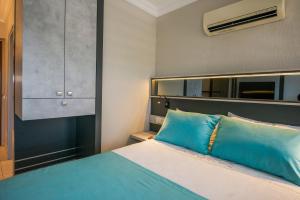 Postel nebo postele na pokoji v ubytování Gocek Arion Hotel