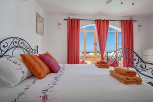 Postel nebo postele na pokoji v ubytování Villa Lea + 17 fotografií