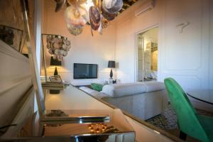 A television and/or entertainment centre at DONDE DUERME EL GUADIANA