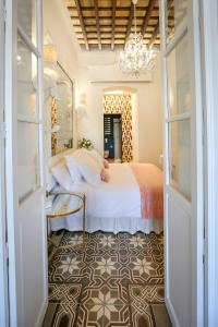 A bed or beds in a room at DONDE DUERME EL GUADIANA