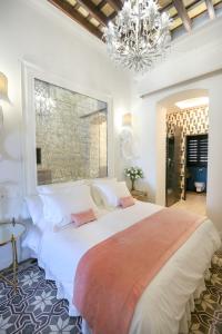 A bed or beds in a room at DONDE DUERME EL GUADIANA