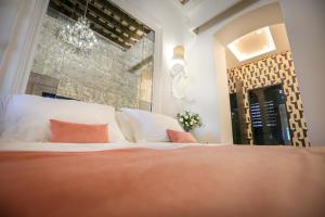 A bed or beds in a room at DONDE DUERME EL GUADIANA