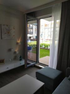 Posteľ alebo postele v izbe v ubytovaní Bel Mare Patio and Garden C108 + 37 fotografií