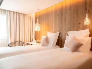 Letto o letti in una camera di Mercure Valence