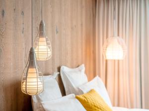 Letto o letti in una camera di Mercure Valence
