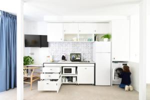 Kuchyň nebo kuchyňský kout v ubytování PATIOdeLUZ - Stylish apartments in Párraga 13