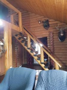 Ein Sitzbereich in der Unterkunft Загородный дом , сруб , рыбалка , баня , отдых , река , лес