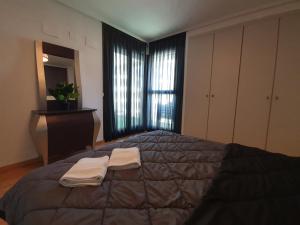 A bed or beds in a room at Style Apartment Patacona Beach segunda linea