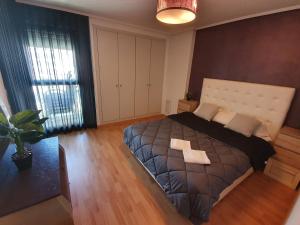 A bed or beds in a room at Style Apartment Patacona Beach segunda linea