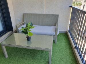 A seating area at Style Apartment Patacona Beach segunda linea