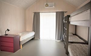 Postel nebo postele na pokoji v ubytování Campsite Ģirti