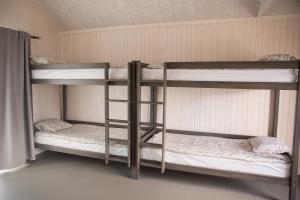 Postel nebo postele na pokoji v ubytování Campsite Ģirti