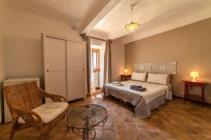 Letto o letti in una camera di San Leo Albergo Diffuso
