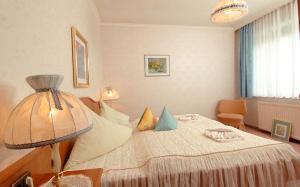 Postel nebo postele na pokoji v ubytování Appartement Eva