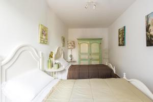 Villa Cinzia-150 mt from the beach客房内的一张或多张床位