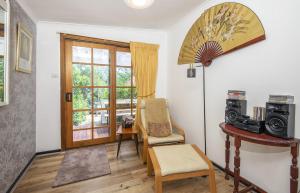 O zonă de relaxare la Bidwell Cottage +12 fotografii