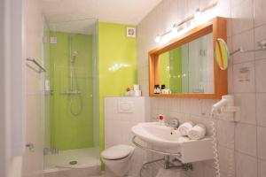 Koupelna v ubytování Haus Leithner - Suiten & Apartments + 37 fotografií