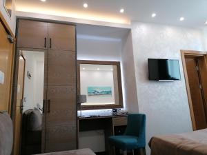 Standardna soba Zlatibor centar 205的电视和/或娱乐中心