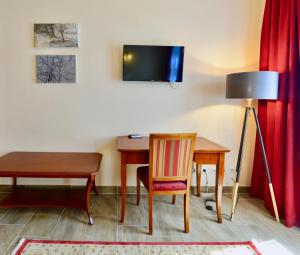 TV a/nebo společenská místnost v ubytování Altwienerhof Boutique Hotel