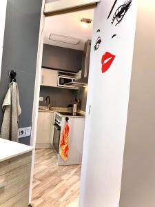 Kuchyň nebo kuchyňský kout v ubytování Apartamento entre dos mares