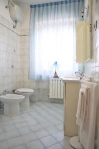 Vonios kambarys apgyvendinimo įstaigoje Appartamento L'arancio