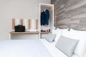Een bed of bedden in een kamer bij Blue View Apartments