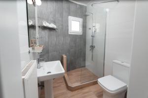 Een badkamer bij Blue View Apartments