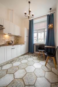 Kuchyň nebo kuchyňský kout v ubytování Scandinavian Apartments