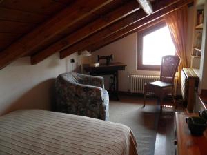 Ένα ή περισσότερα κρεβάτια σε δωμάτιο στο Ribolla +21 φωτογραφίες