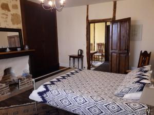 Postel nebo postele na pokoji v ubytování DUC MANOIR Chambres d'hôtes