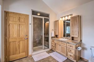 a bathroom with a shower and a sink and a toilet at Slopeside Sanctuary - Penthouse Less Than 1 Mi to Lifts! in Winter Park +34 photos