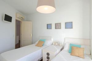 Ein Bett oder Betten in einem Zimmer der Unterkunft Casa Mediterraneo