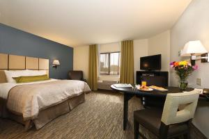 Postel nebo postele na pokoji v ubytování Candlewood Suites East Lansing by IHG