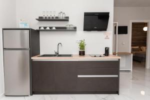 Een keuken of kitchenette bij Blue View Apartments