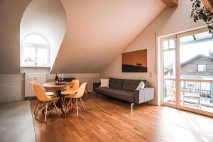 Posezení v ubytování VISITALPS moderne Ferienwohnung nähe München u Salzburg + 6 fotografií