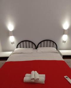 Cecio 5 Terre Rooms tesisinde bir odada yatak veya yataklar