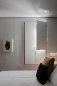 Postel nebo postele na pokoji v ubytování Tá Hotel de diseño + 23 fotografií