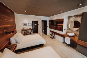Katil atau katil-katil dalam bilik di La Urumpta Hotel by AKEN Mind