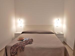 Postel nebo postele na pokoji v ubytování Mini Appartamenti Elba