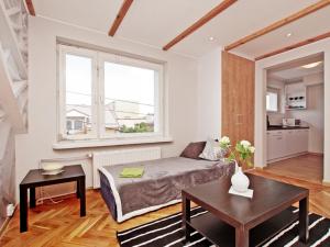 Kuchyňa alebo kuchynka v ubytovaní Apartamenty Gdynia