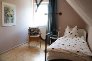 מיטה או מיטות בחדר ב-Ferienhaus Lenchen