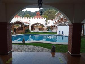 Bazén v ubytování Hotel Leyenda del Tepozteco nebo v jeho okolí