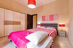 A bed or beds in a room at Skalina