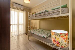 A bed or beds in a room at Skalina