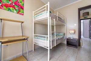 A bed or beds in a room at Skalina