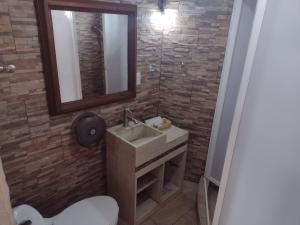 Koupelna v ubytování Hotel Leyenda del Tepozteco